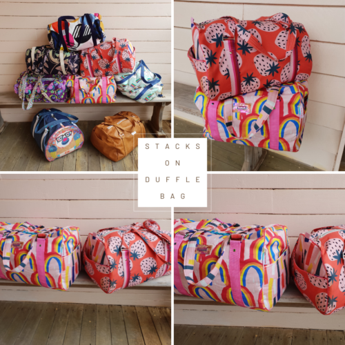 Multiple duffle bags laying on top of each other, on a timber bench, white wall behind them. Various colours and styles of fabric